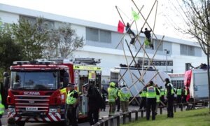 Climate Protesters Disrupt British Newspaper Distribution