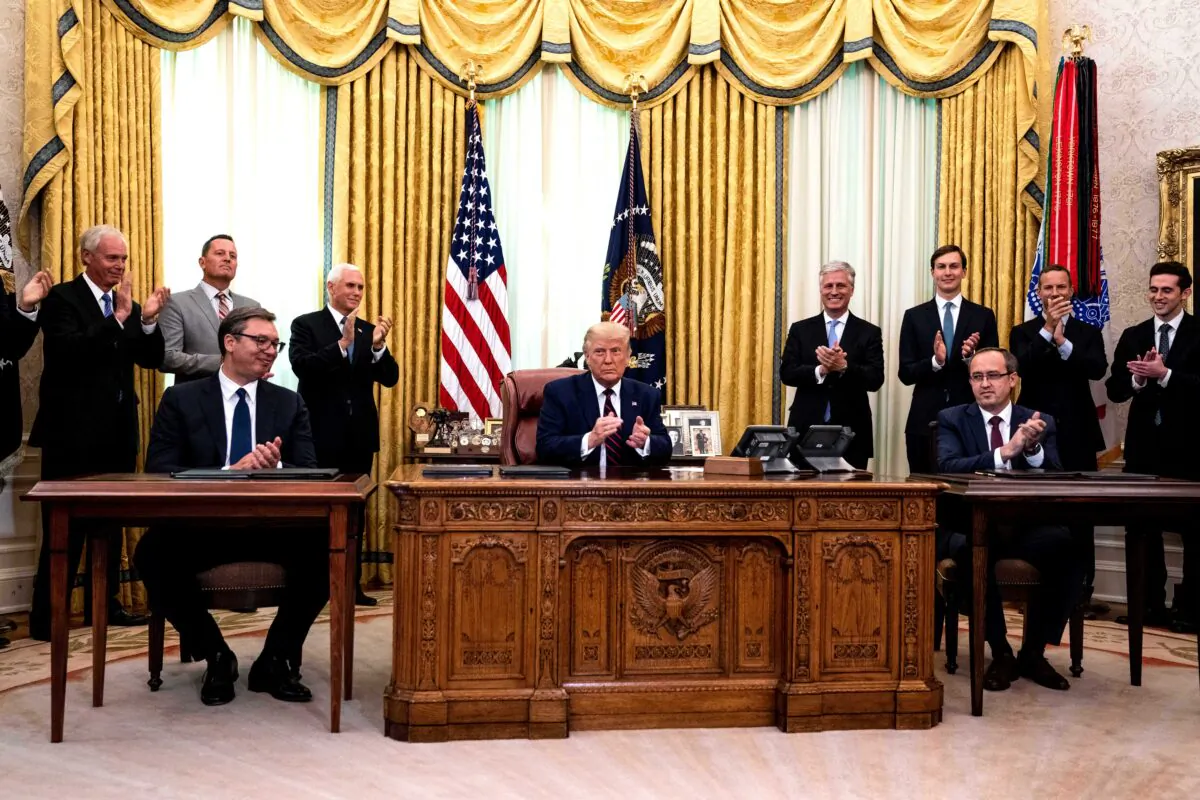 President Donald Trump, center, participates in a signing ceremony and meeting with the President of Serbia Aleksandar Vucic, left, and the Prime Minister of Kosovo Avdullah Hoti, right, in the Oval Office of the White House on Sept. 4, 2020. (Anna Moneymaker-Pool/Getty Images)