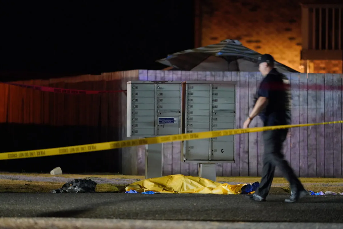 The scene where Michael Forest Reinoehl was shot by law enforcement officers who tried apprehending him is seen in Lacey, Wash., on Sept. 3, 2020. (Ted Warren/AP Photo)