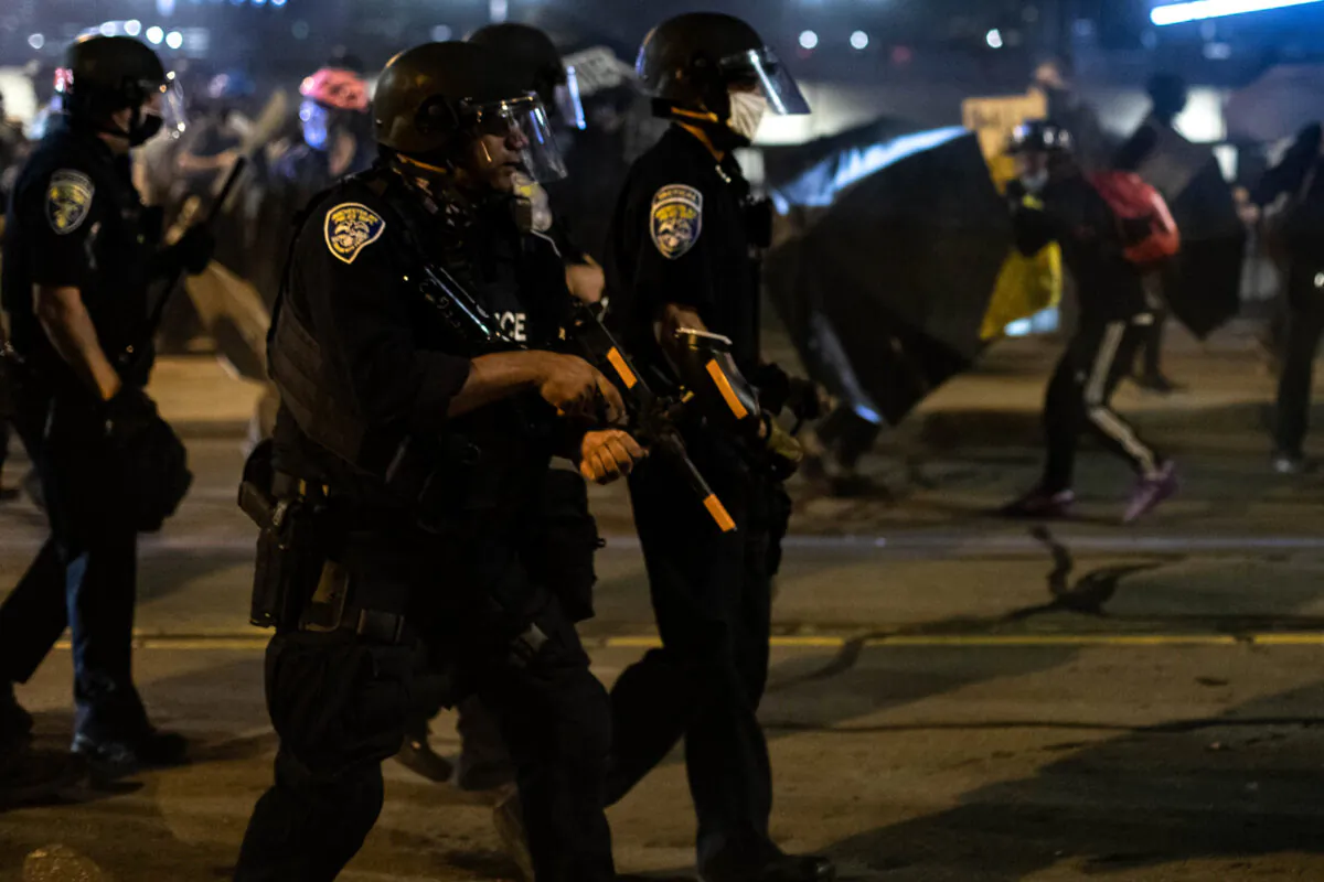 Police disperse a crowd in Rochester, N.Y., on Sept. 4, 2020. (Maranie R. Staab/AFP via Getty Images)