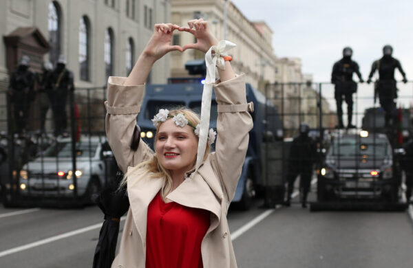 People attend an opposition rally to reject the presidential election results in Minsk