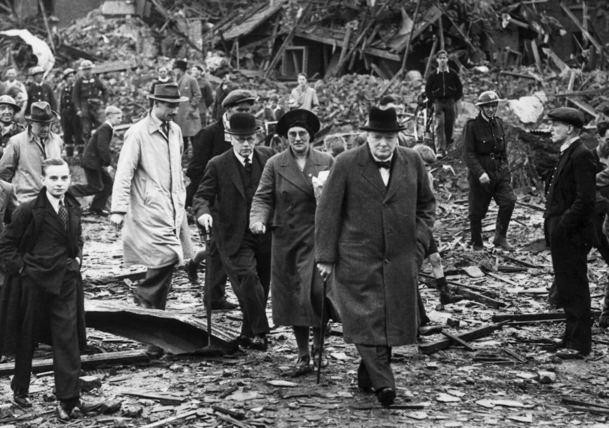 British Prime Minister Winston Churchill inspects air raid damage in Battersea, south London, during the Blitz, on Sept. 10, 1940. (Reg Speller/Fox Photos/Hulton Archive/Getty Images)