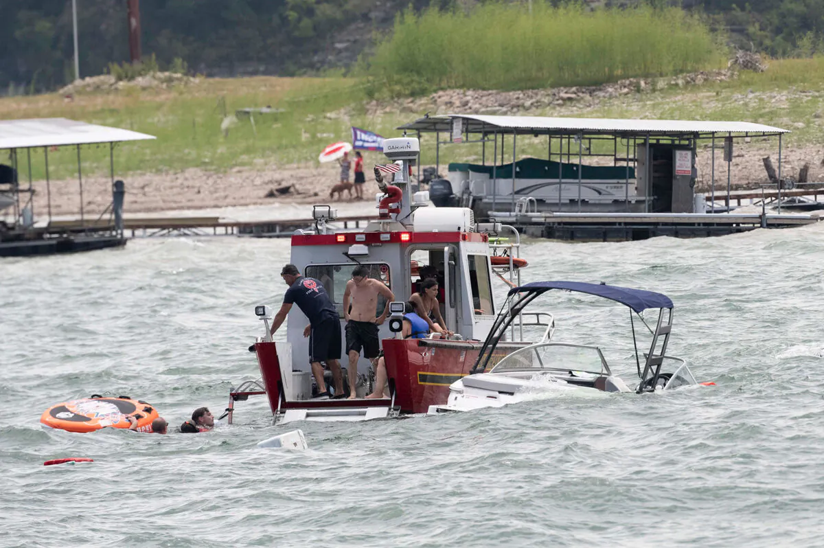 A boat taking part in a Trump support parade sinks in Lake Travis, Texas, on Sept. 5 2020. (Courtesy of Bob Daemmrich)