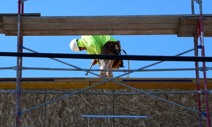 A file photo of a construction worker on a site in Los Angeles, Calif., on April 23, 2020. (Frederic J. Brown/AFP via Getty Images)
