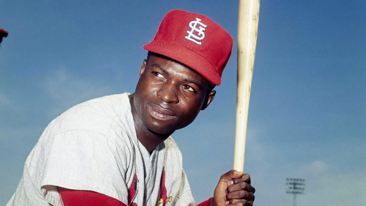 Lou Brock, of the St. Louis Cardinals, poses in Miss. on April 9, 1965. (AP Photo, File)