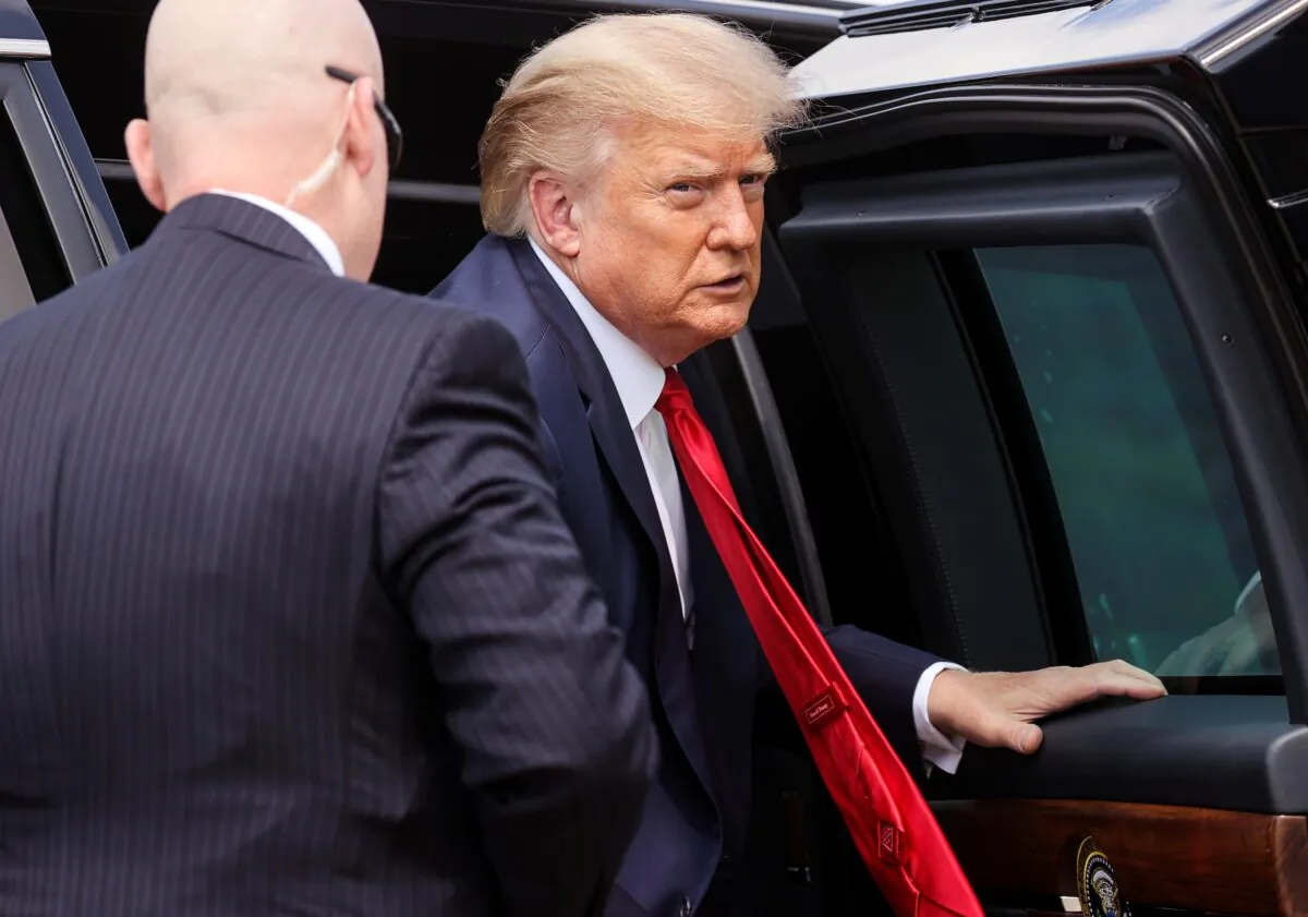 President Donald Trump exits a vehicle prior to boarding Air Force One as he departs Washington for campaign travel to Florida and North Carolina at Joint Base Andrews, Md., on Sept. 8, 2020. (Jonathan Ernst/Reuters)