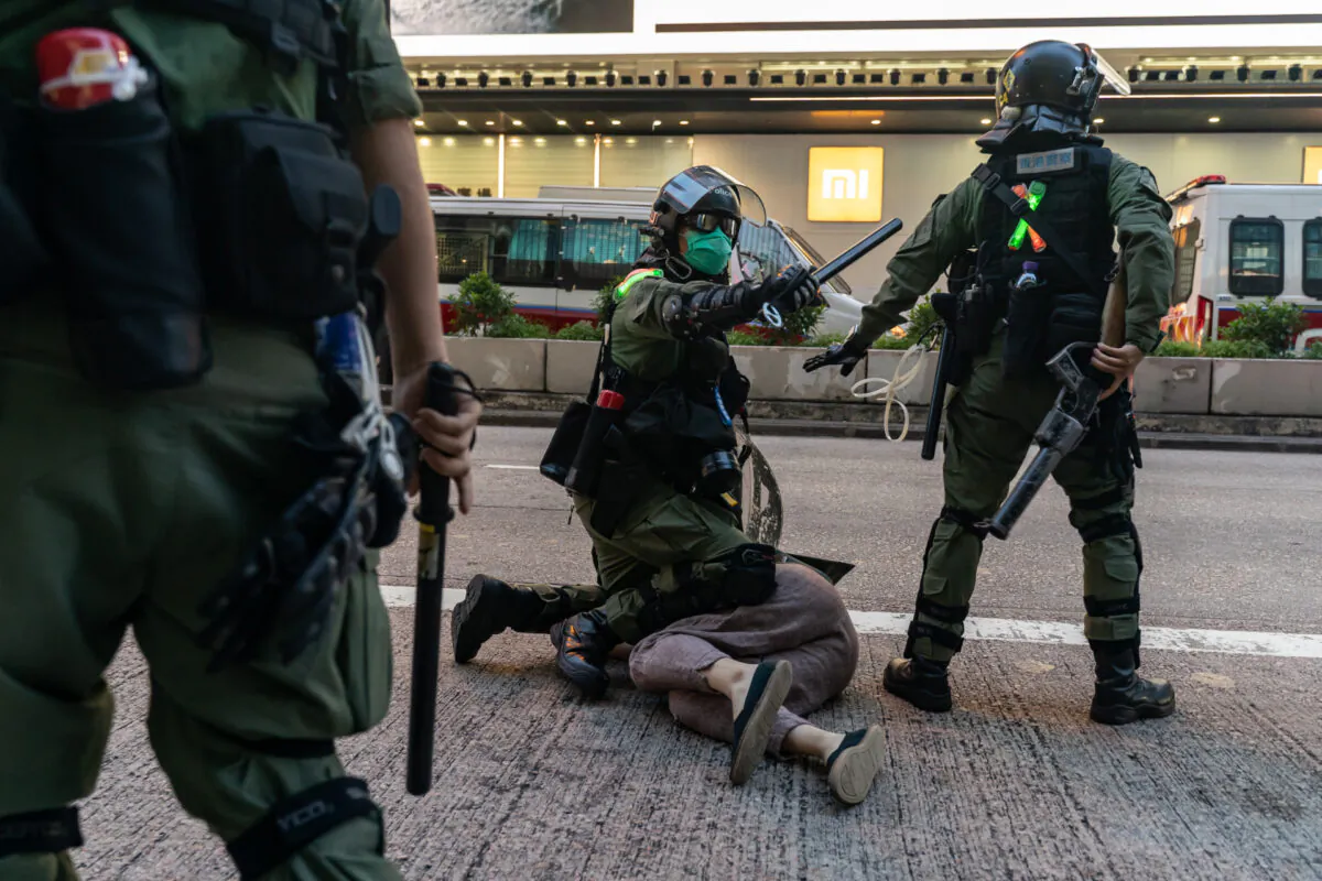 Riot police arrest a man during a pro-democracy protest in Hong Kong on Sept. 6, 2020. (Anthony Kwan/Getty Images)