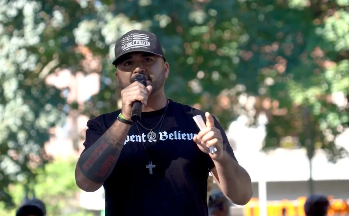 Founder of conservative group Patriot Prayer Joey Gibson speaks at a memorial for Portland shooting victim Aaron "Jay" Danielson, at Esther Short Park in Vancouver, Washington, on Sept. 5, 2020. (The Epoch Times)