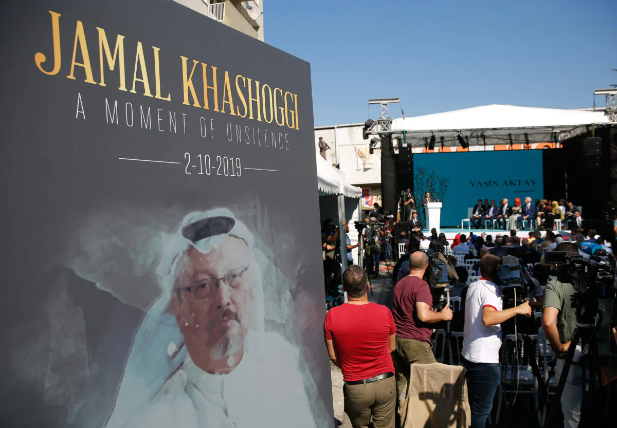 A picture of slain Saudi journalist Jamal Kashoggi, is displayed during a ceremony near the Saudi Arabia consulate in Istanbul on Oct. 2, 2019.(Lefteris Pitarakis/AP)