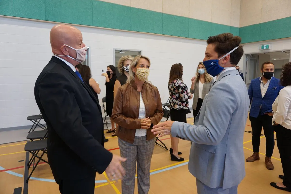 Quebec MNA Ian Lafreniere, Longueuil Mayor Sylvie Parent, and Justice Minister Simon Jolin-Barrette were at Laurent-Benoît School in Longueuil, Quebec, to announce investments in education infrastructure, on Sept. 3, 2020.(Sylvie Parent/Facebook)