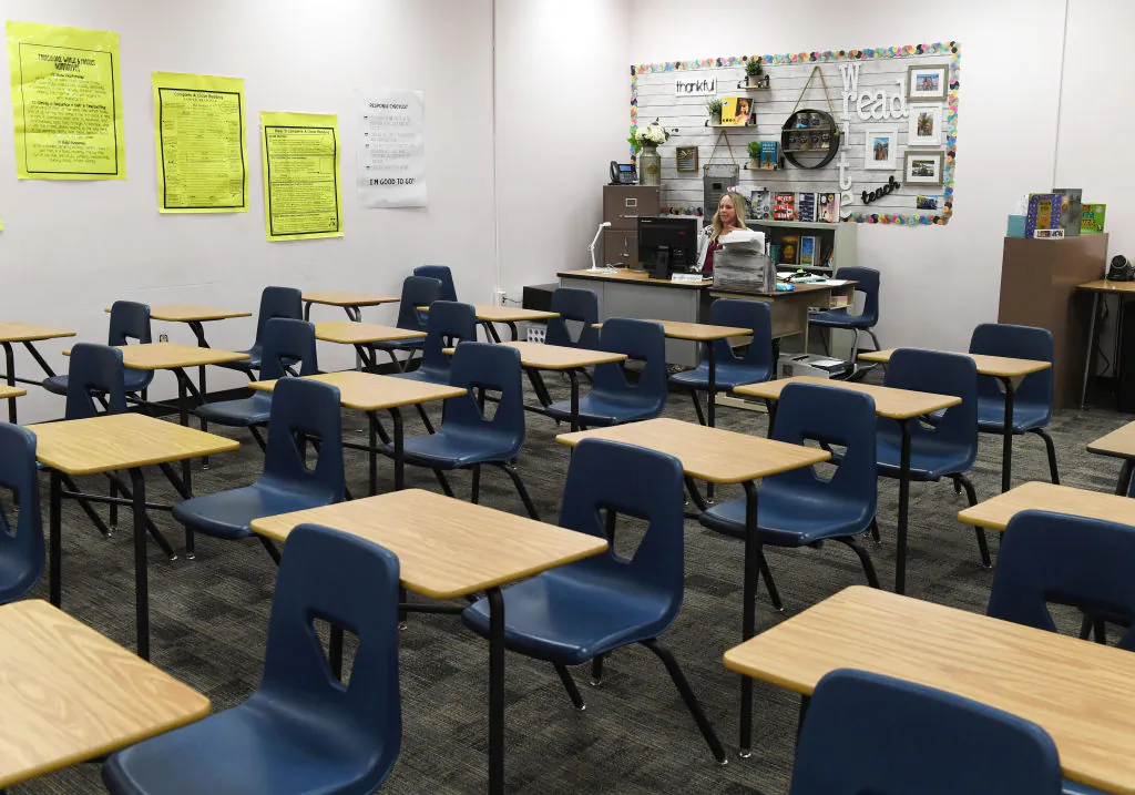 Kellie Goodall teaches an online eighth grade English class from her empty classroom at Walter Johnson Junior High School on the first day of distance learning for the Clark County School District amid the spread of the COVID-19 in Las Vegas, Nev., on Aug. 24, 2020. (Ethan Miller/Getty Images)
