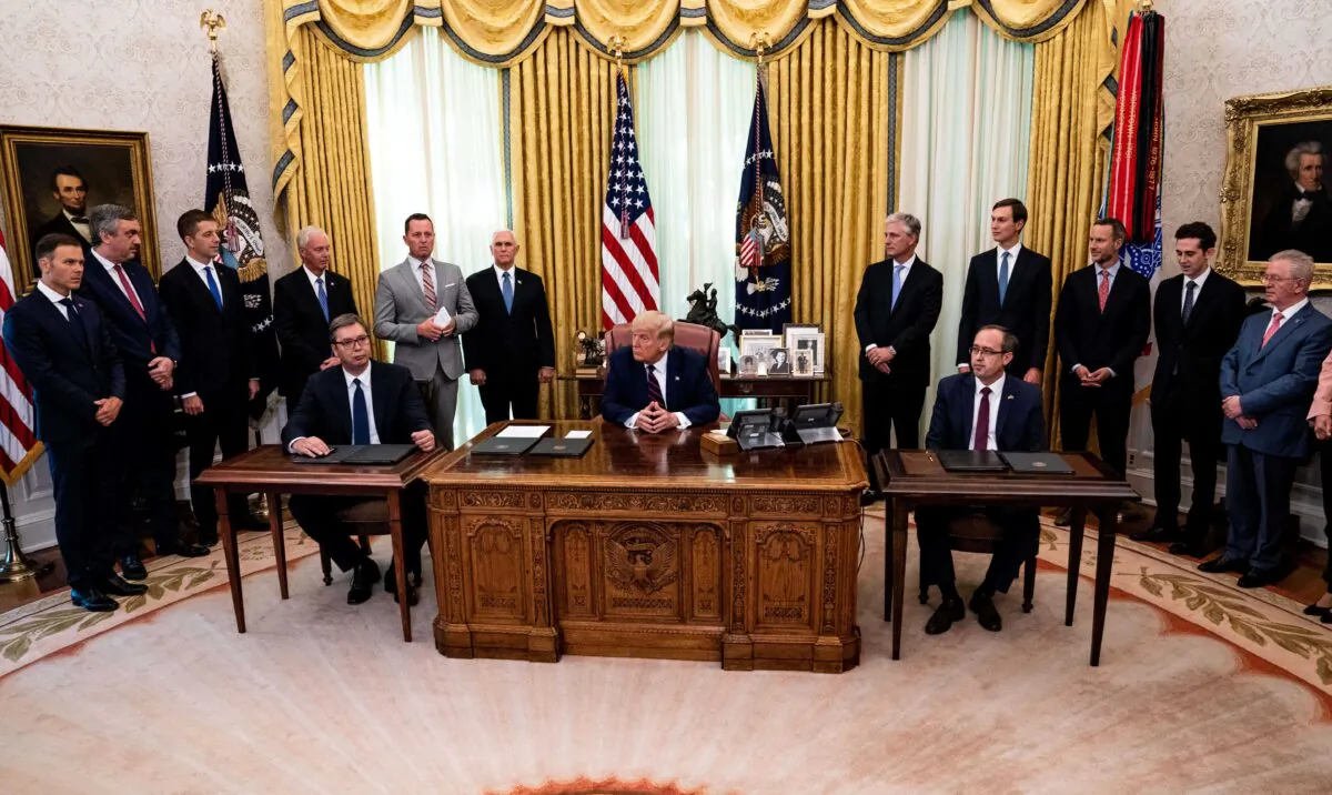 President Donald Trump (C) participates in a signing ceremony and meeting with the Serbian President Aleksandar Vucic (L) and the Kosovo Prime Minister Avdullah Hoti (R) in the Oval Office of the White House in Washington on Sept. 4, 2020. (Anna Moneymaker/Pool/Getty Images)