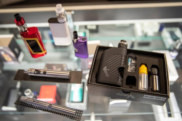 Vaping devices are displayed at a store