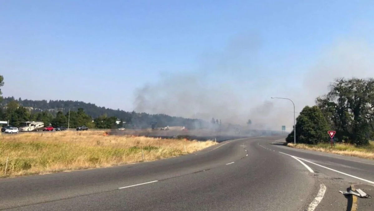A brush fire is seen in the median of a state highway in Puyallup, Wash., on Sept. 9, 2020. (Washington State Patrol Trooper Ryan Burke)

