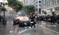 Man Charged With Burning Seattle Police Cars During Seattle Riot