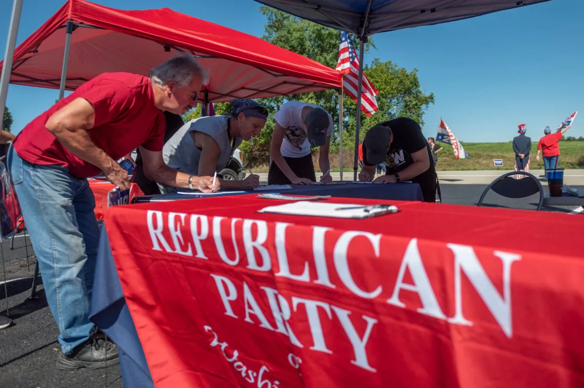 People register to vote during a Republican voter registration in Brownsville, Pennsylvania, on Sept. 5, 2020. (Andrew Caballero-Reynolds/AFP via Getty Images)