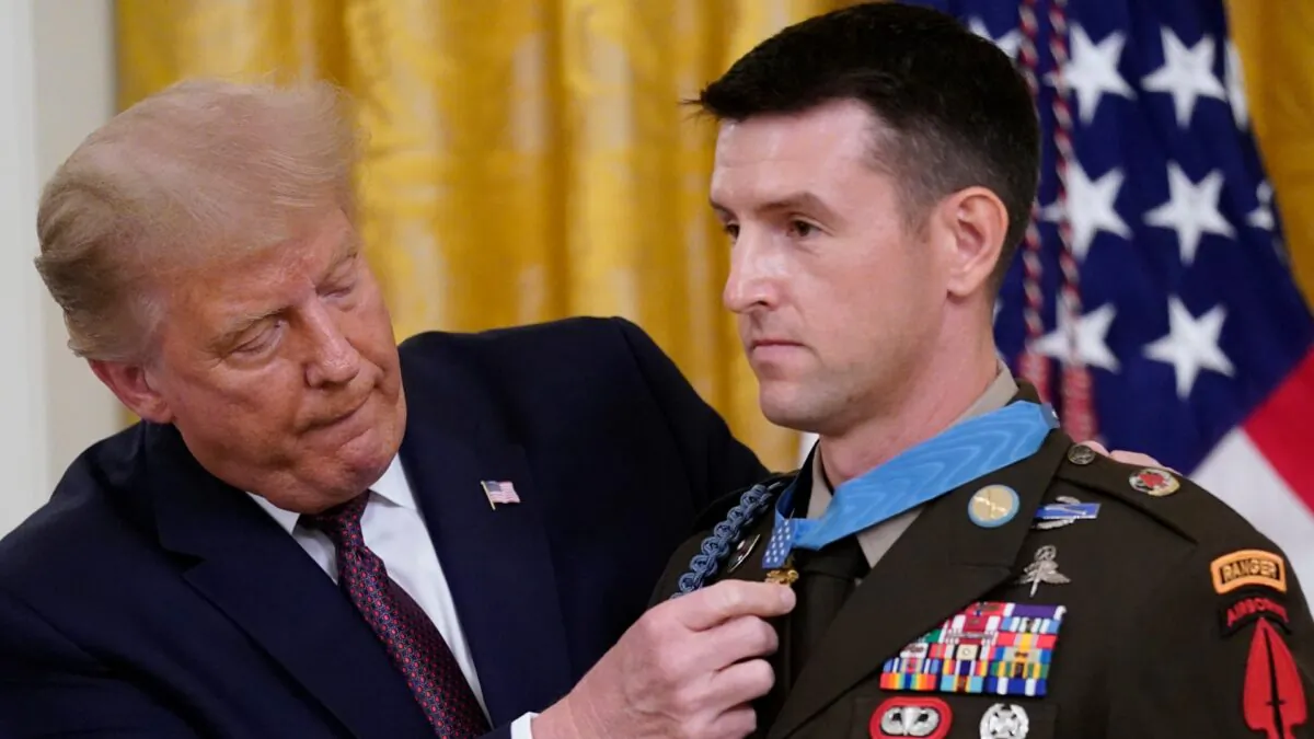 President Donald Trump awards the Medal of Honor to Army Sgt. Maj. Thomas P. Payne in the East Room of the White House in Washington, on Sept. 11, 2020. (Andrew Harnik/AP Photo)