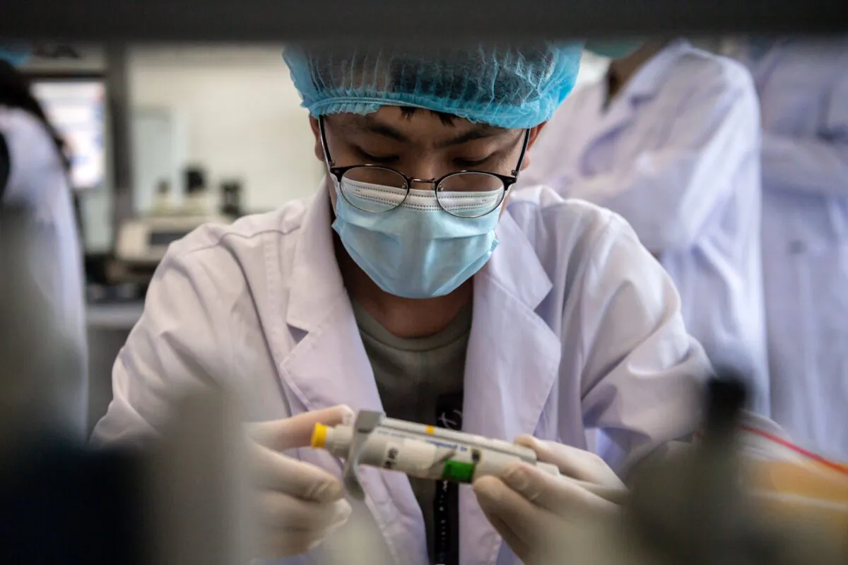 A worker inside a laboratory in Beijing on May 14, 2020. (Nicolas Asfouri/AFP via Getty Images)