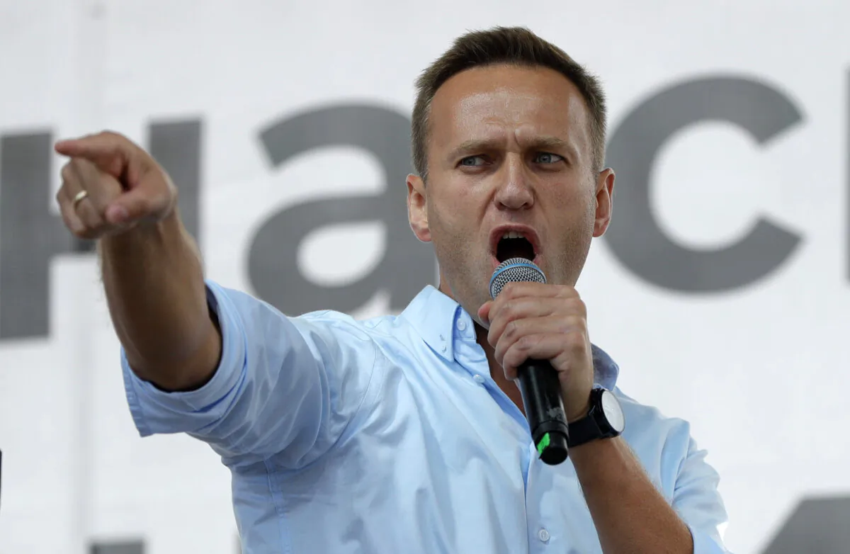 In this file photo, Russian opposition activist Alexei Navalny gestures while speaking to a crowd during a political protest on in Moscow, Russia, on  July 20, 2019,. (Pavel Golovkin/AP)