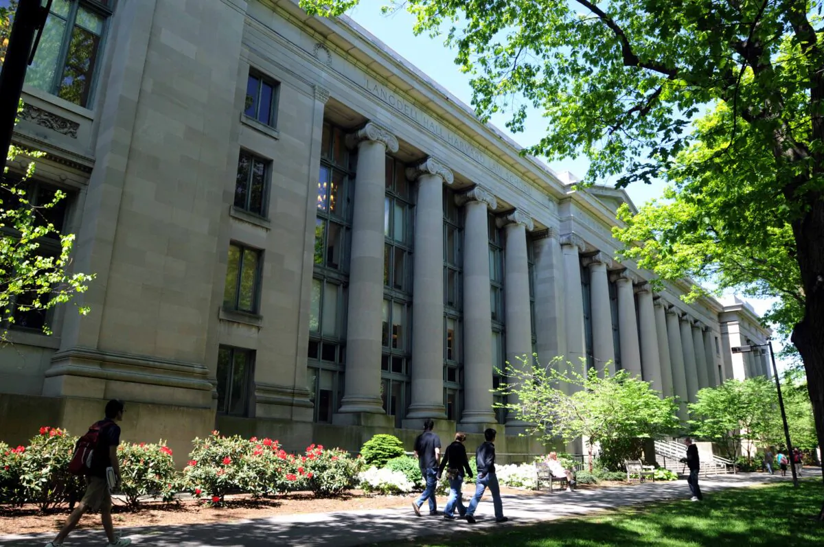 People walk outside Harvard Law School's Langdell Hall at Harvard University in Cambridge, Mass., on May 10, 2010. (Darren McCollest er/Getty Images)
