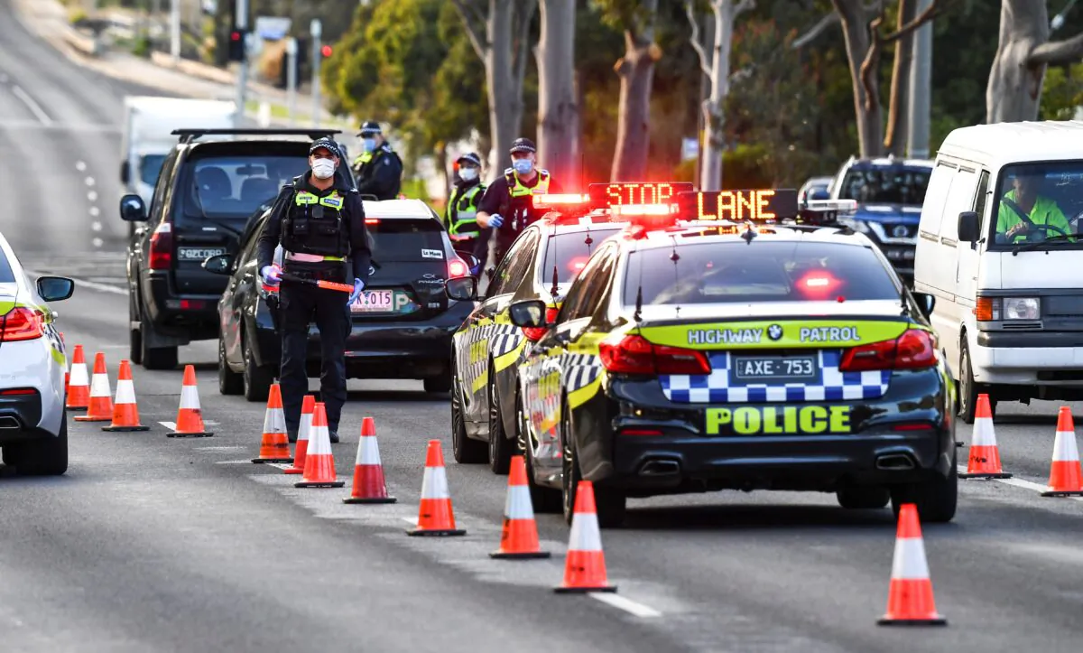 Police pull vehicles aside at a checkpoint in the locked-down suburb of Broadmeadows in Melbourne on July 2, 2020. (William West/AFP via Getty Images)