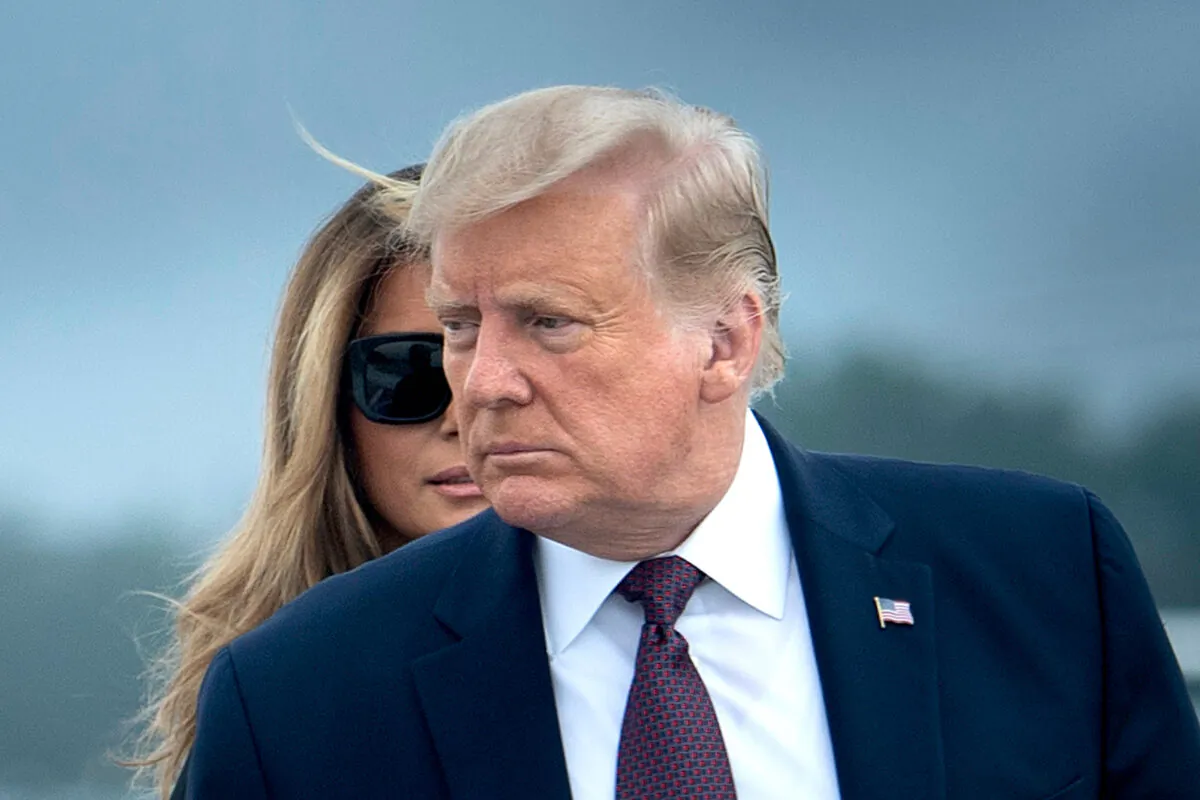 President Donald Trump and First Lady Melania Trump board Air Force One at Joint Base Andrews in Maryland on Sept. 11, 2020. (Brendan Smialowski/AFP via Getty Images)