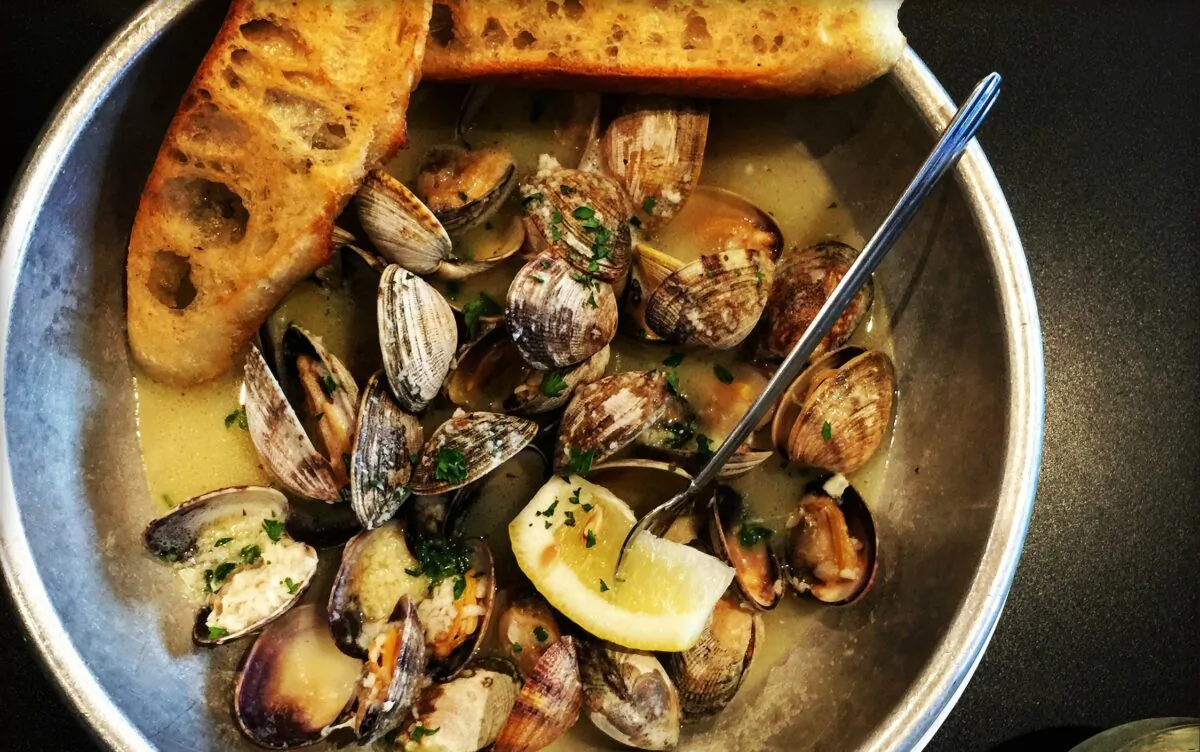 Littleneck clams are the preferred type of clam for this recipe. They are the smallest quahog clam, with sweet and tender meat. (Lynda Balslev for TasteFood)