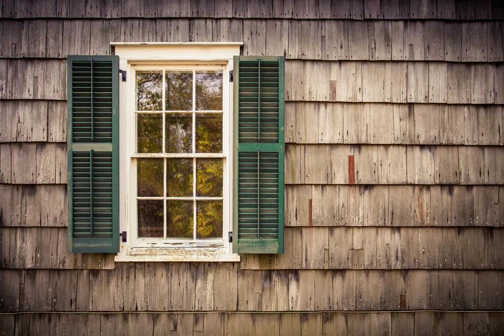 Cedar is naturally resistant to insects and moisture but regular maintenance is needed. (littlenySTOCK/Shutterstock)