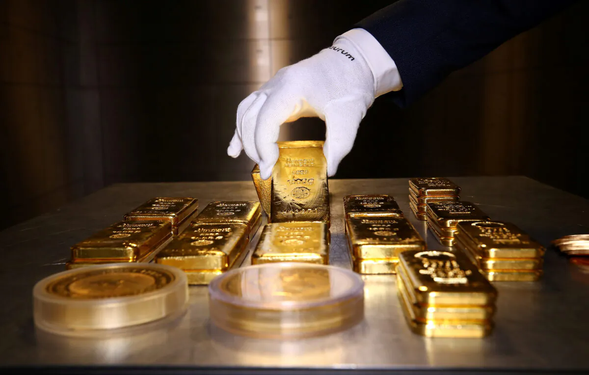 Gold bars and coins are stacked in the safe deposit boxes room of the Pro Aurum gold house in Munich, Germany, on Aug. 14, 2019. (Michael Dalder/Reuters)