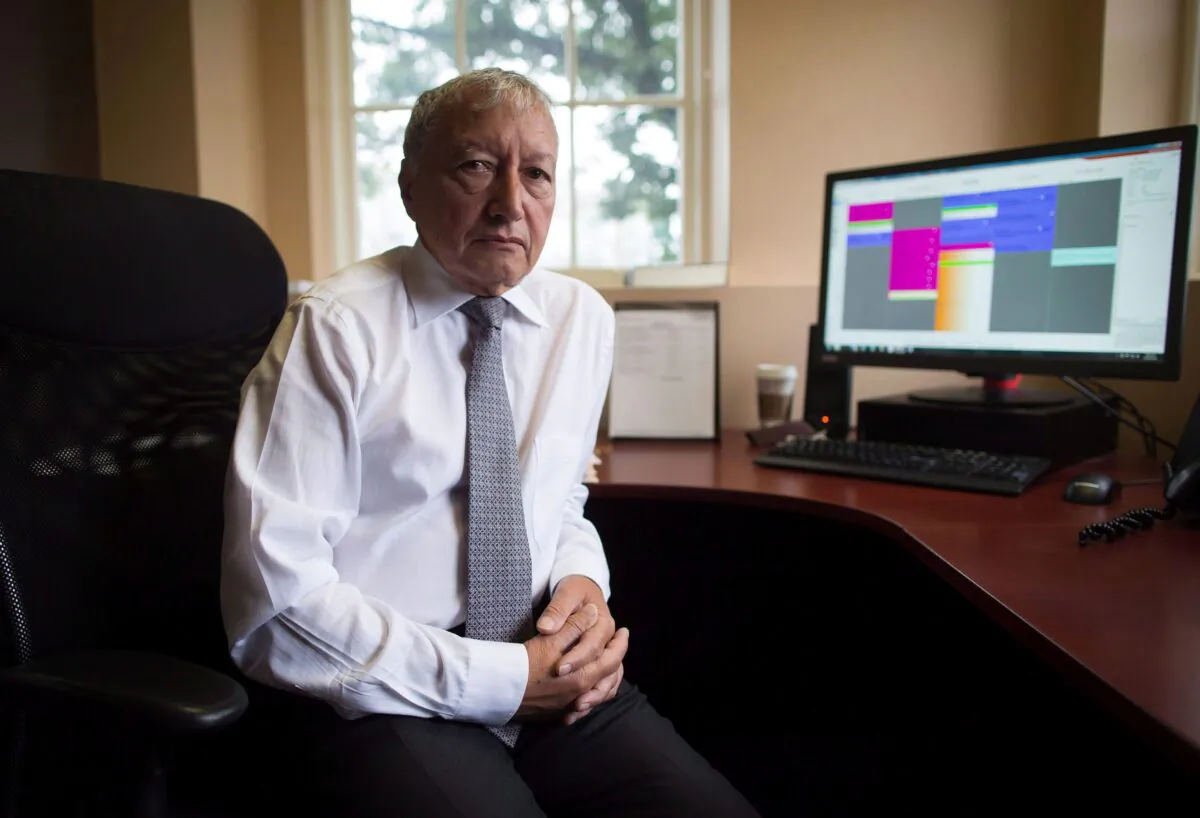 Dr. Brian Day sits for a photograph at his office in Vancouver on Aug. 31, 2016. (The Canadian Press/Darryl Dyck)