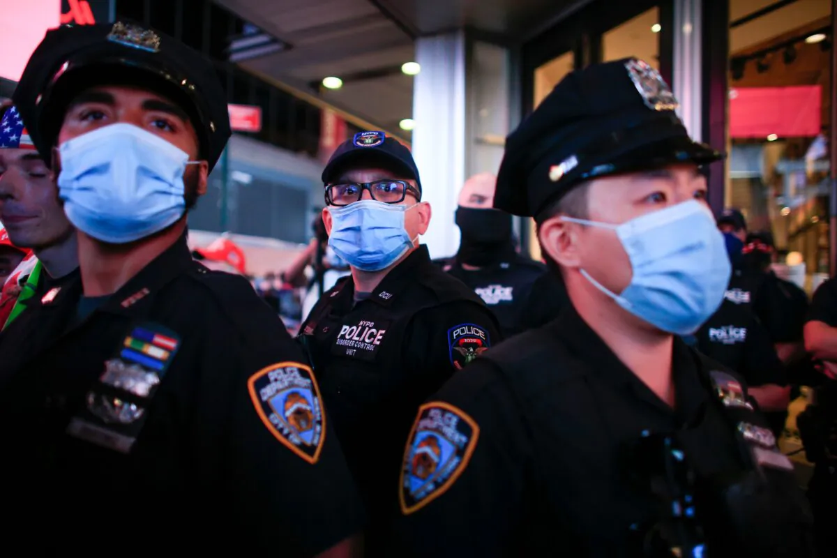 NYPD officers stand guard during a protest in New York City, on Sept. 3, 2020. (Kena Betancur/AFP via Getty Images)