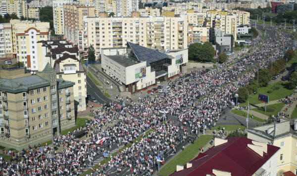 Protesters march during an opposition supporters rally in Minsk