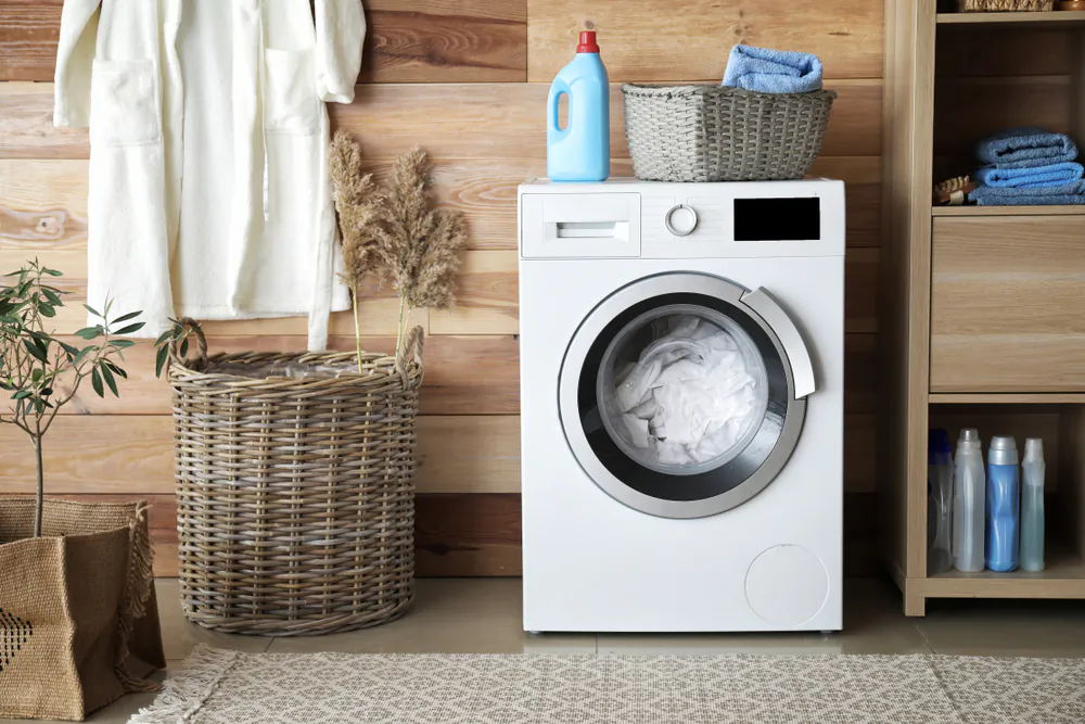 You can add baking soda to the wash cycle to boost liquid detergent. (Pixel-Shot/Shutterstock)