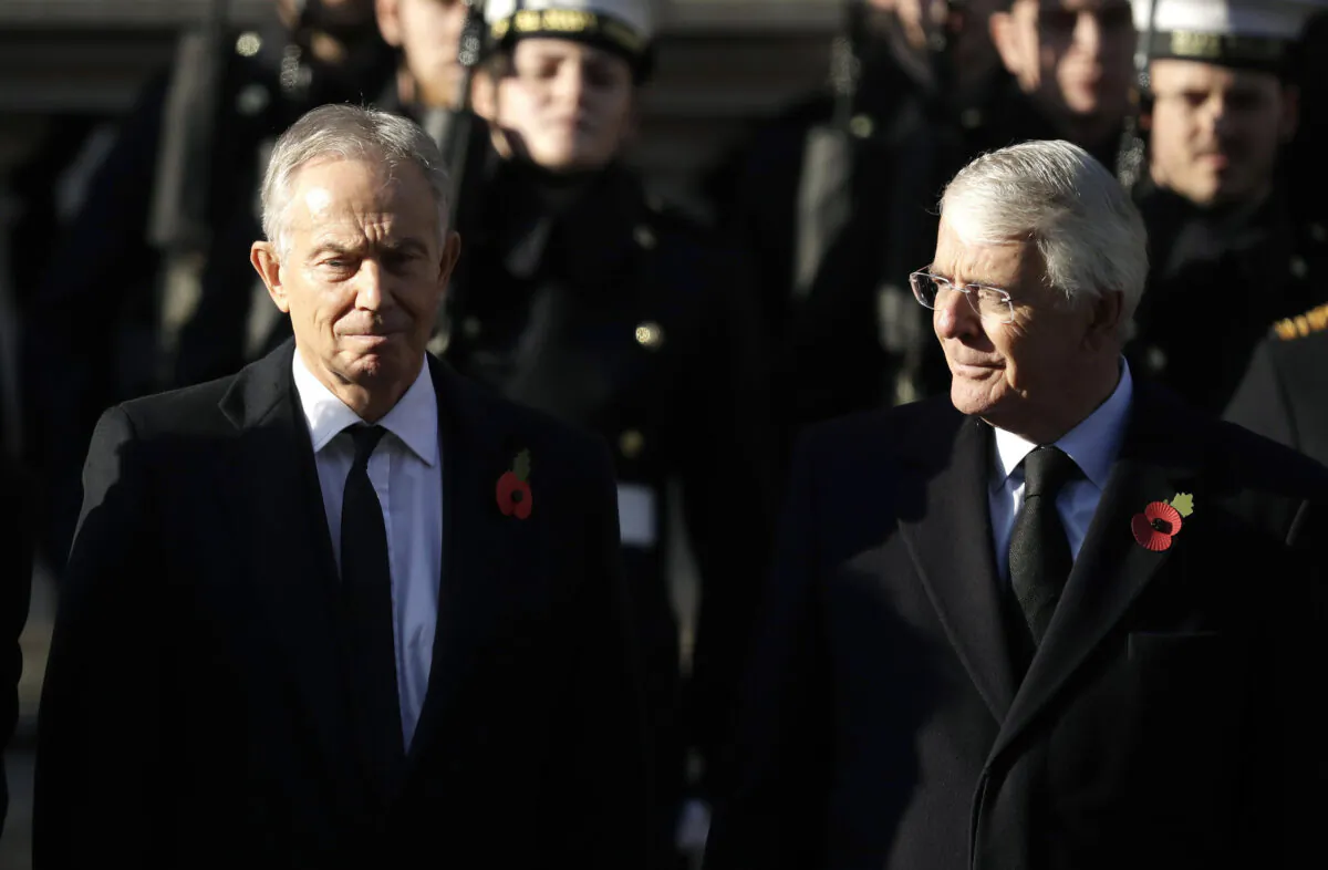 Former British Prime Ministers Tony Blair (L) and John Major in London on Nov. 10, 2019.  (Matt Dunham/AP Photo)