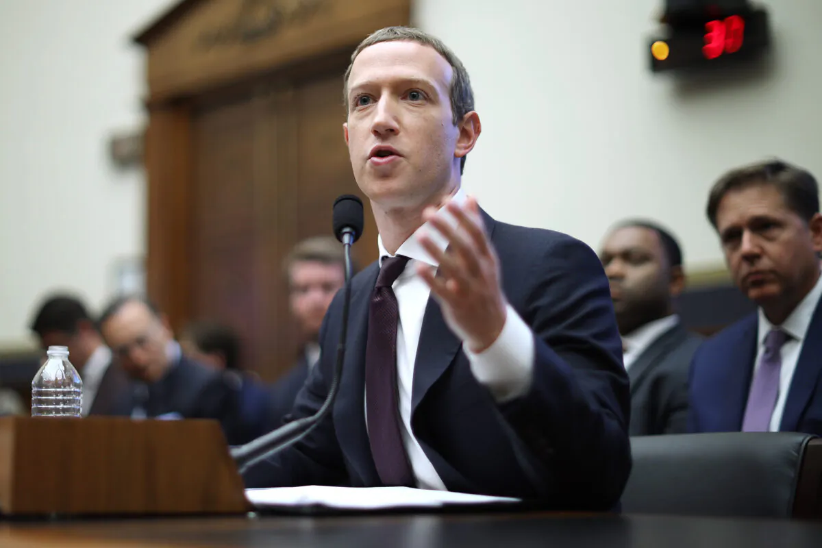 Facebook co-founder and CEO Mark Zuckerberg testifies before the House Financial Services Committee in the Rayburn House Office Building on Capitol Hill in Washington on Oct. 23, 2019. Zuckerberg testified about Facebook's proposed cryptocurrency Libra, how his company will handle false and misleading information by political leaders during the 2020 campaign, and how it handles its users’ data and privacy. (Chip Somodevilla/Getty Images)