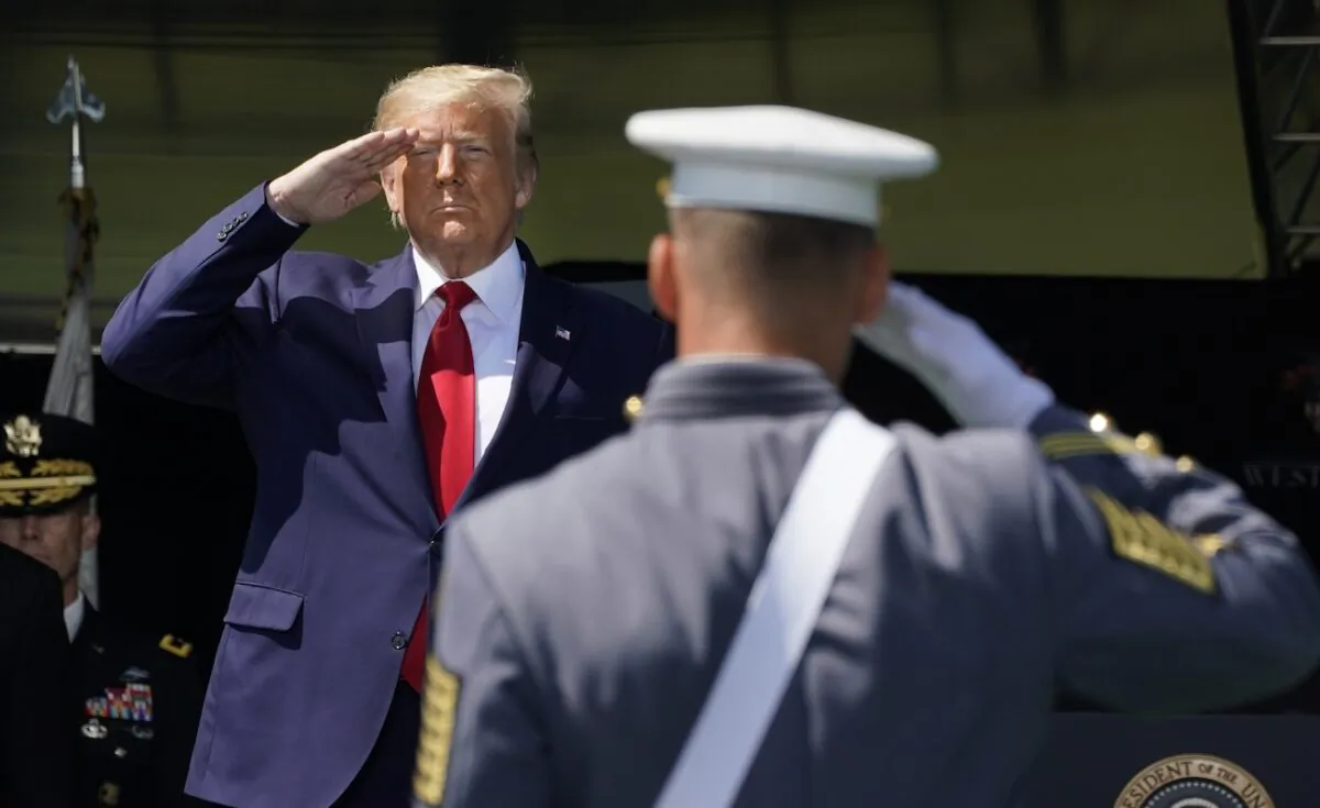 President Donald Trump salutes as he arrives at the 2020 U.S. Military Academy graduation ceremony in West Point, N.Y., on June 13, 2020. (Timothy A. Clary/AFP via Getty Images)
