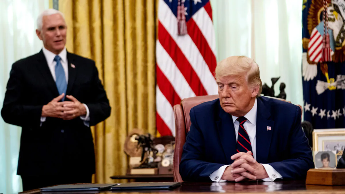 Vice President Mike Pence speaks as President Donald Trump participates in a signing ceremony and meeting with the President of Serbia Aleksandar Vucic and the Prime Minister of Kosovo Avdullah Hoti in the Oval Office of the White House in Washington on Sept. 4, 2020. (Anna Moneymaker-Pool/Getty Images)