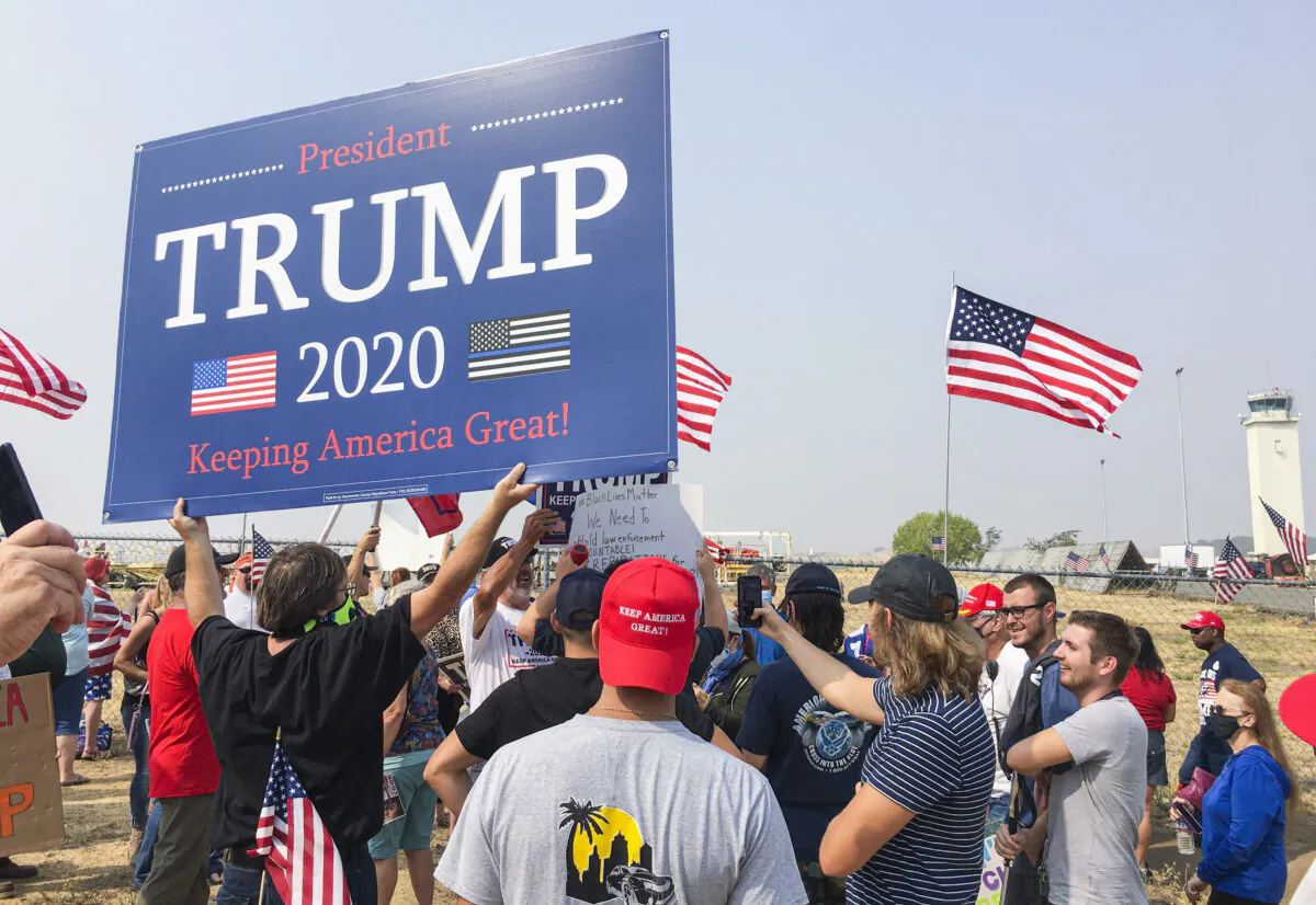 Trump supporters gather to greet the president at Sacramento McClellan Airport on Sept. 14, 2020. (Ilene Eng/The Epoch Times)