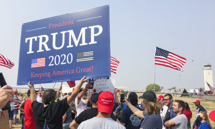 Trump supporters gather to greet the president at Sacramento McClellan Airport on Sept. 14, 2020. (Ilene Eng/The Epoch Times)