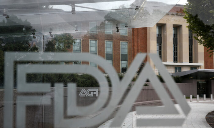 Food and Drug Administration (FDA) signage is seen through a bus stop at the U.S. Department of Health and Human Services, in Silver Spring, Md., on Thursday, Aug. 2, 2018. (Jacquelyn Martin/AP)