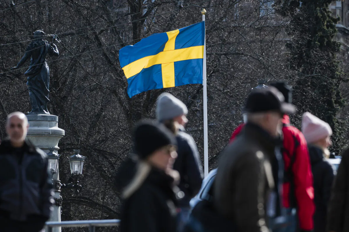 The Swedish flag flies in Stockholm on April 4, 2020. (Jonathan Nackstrand/AFP via Getty Images)