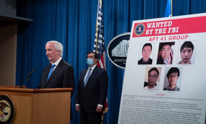 Deputy Attorney General Jeffery A. Rosen talks about charges and arrests related to a hacking campaign tied to the Chinese regime, at the Department of Justice in Washington on Sept. 16, 2020. (Tasos Katopodis/AFP via Getty Images)