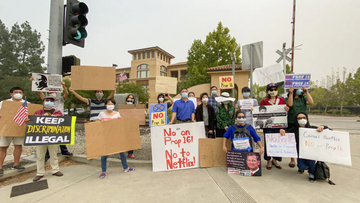 Protesters gather at the Netflix headquarters in Los Gatos, Calif., on Sept. 11, 2020, to decry a donation Patricia Quillin, wife of Netflix co-founder Reed Hastings, made to support Proposition 16. (Ilene Eng/The Epoch Times)