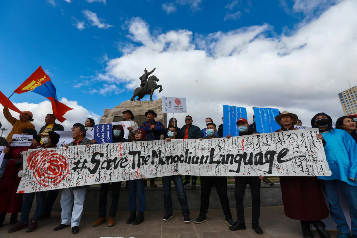 Mongolians protest in Ulaanbaatar, Mongolia against China's plan to introduce Mandarin-only classes in Southern Mongolia, on Sept. 15, 2020. (Byambasuren BYAMBA-OCHIR / AFP via Getty Images)