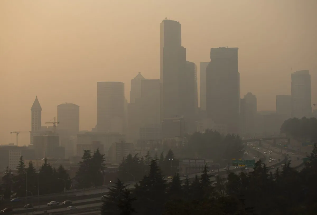 Cars drive on I-5 in front of a hazy Seattle skyline due to wildfire smoke in Seattle, Wash., Sept. 11, 2020. (Lindsey Wasson/Getty Images)