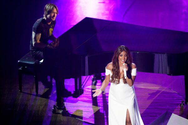 Mickey Guyton and Keith Urban perform