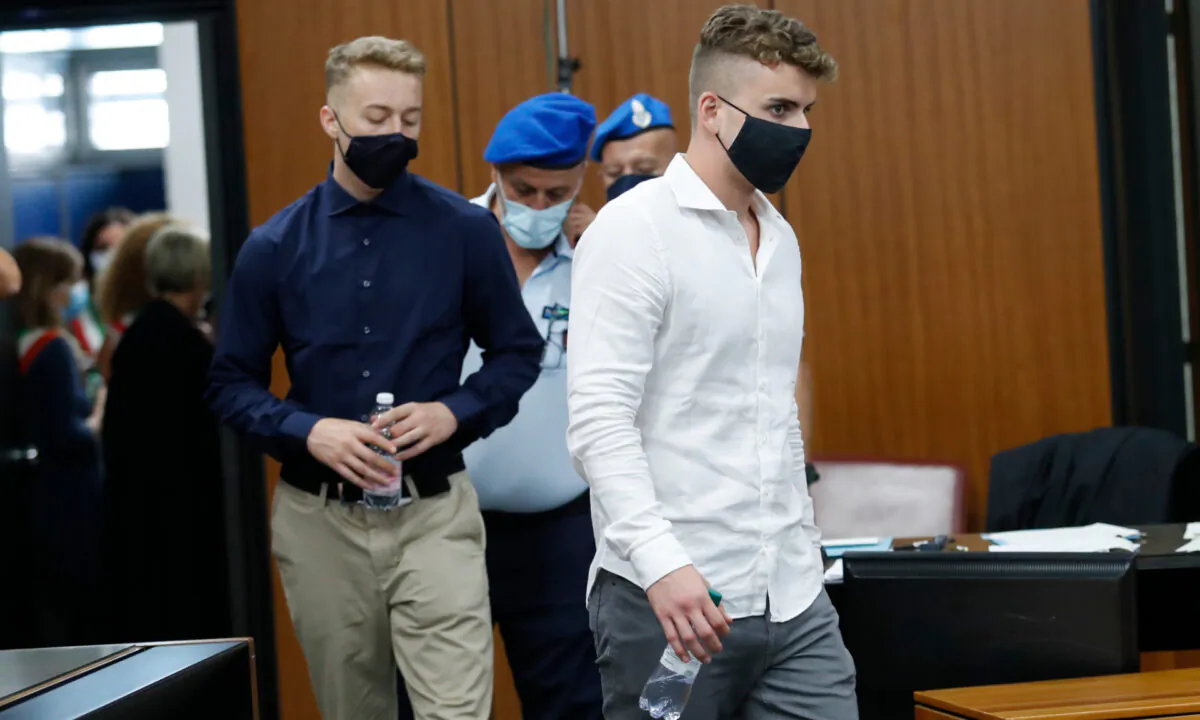Gabriel Natale-Hjorth (R) and Finnegan Lee Elder, from California, arrive in court for a hearing in their trial where they are accused of slaying a plainclothes Carabinieri officer while on vacation in Italy last summer, in Rome, on Sept. 16, 2020. (Remo Casilli/Pool Photo via AP)

