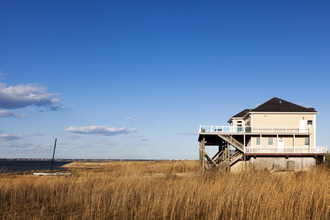 Vacation homes, like this one in the Hamptons, have become a refuge for city dwellers fleeing COVID-19, but the massive migration has overwhelmed services in some of these smaller rural communities. (Michael Rega/Shutterstock)
