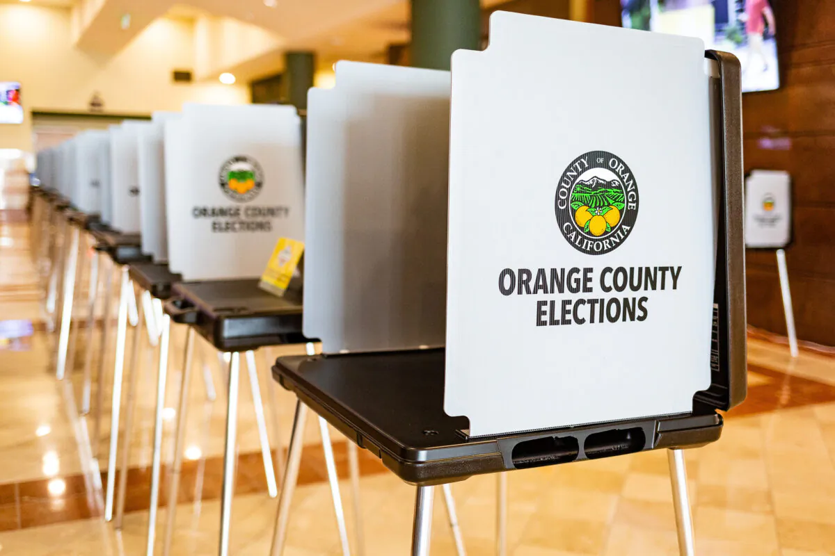 Orange County election stands await voters inside the Honda Center, which has been converted into a polling place, in Anaheim, Calif., on Sept. 16, 2020. (John Fredricks/The Epoch Times)