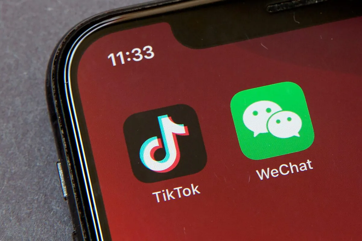 Icons for the smartphone apps TikTok and WeChat are seen on a smartphone screen in Beijing, on Aug. 7, 2020. (Mark Schiefelbein/AP Photo)